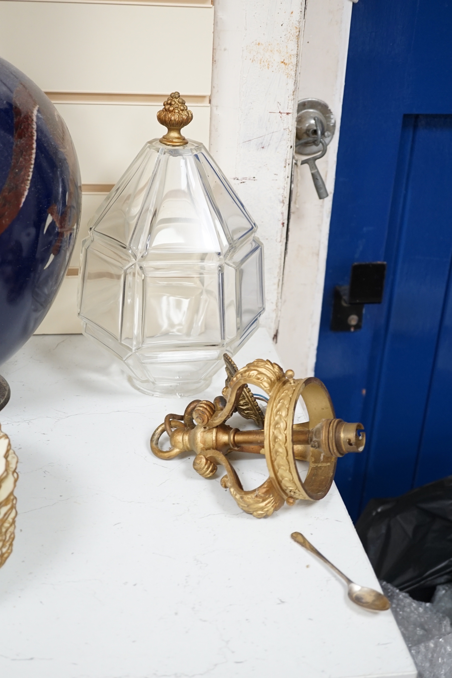 Two early 20th century gilt metal and art glass hall lanterns